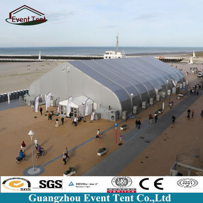 China Large Aluminum Frame TFS Curved Tents Outdoor Warehouse Tent 75kg/Sqm supplier